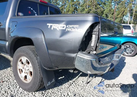 2015 Toyota Tacoma Base V6/Trd Pro z USA, uszkodzony, nr VIN 3TMLU4EN5FM205879